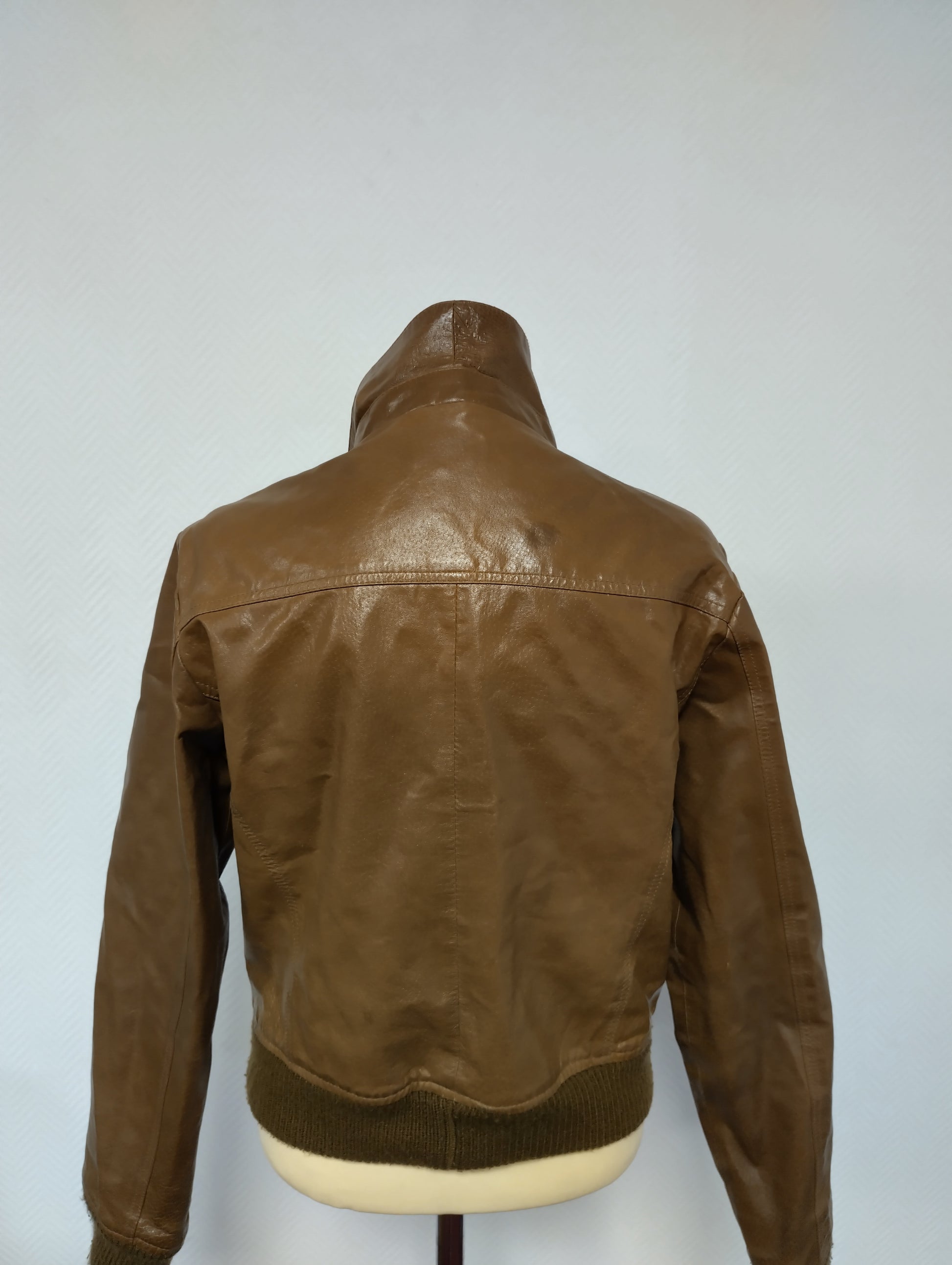 Back view of brown leather jacket