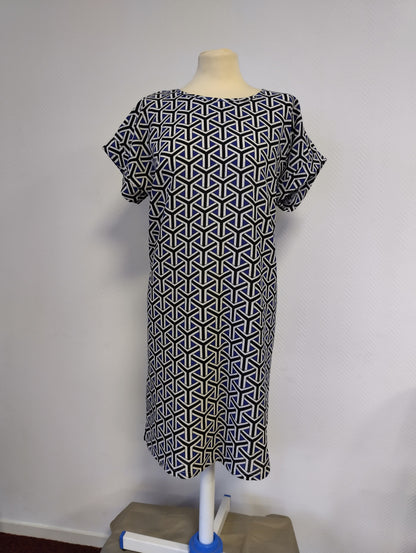 Full view of the dress on a mannequin