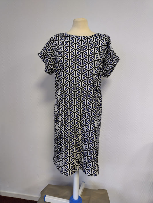 Full view of the dress on a mannequin