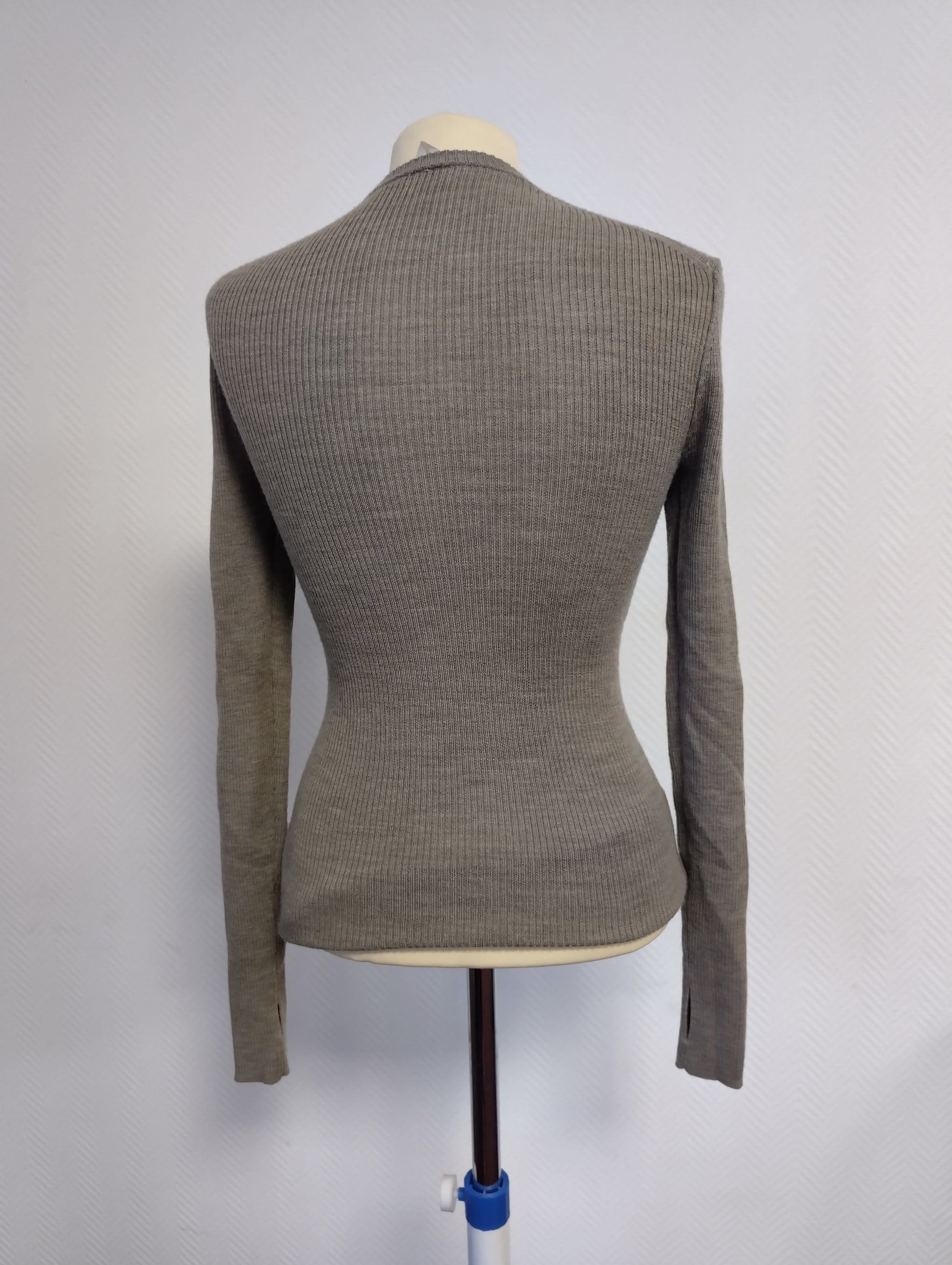 Back view of the grey ribbed sweater