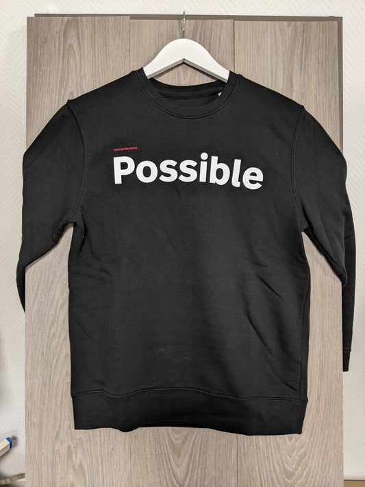Front view of black sweatshirt with 'Possible' print