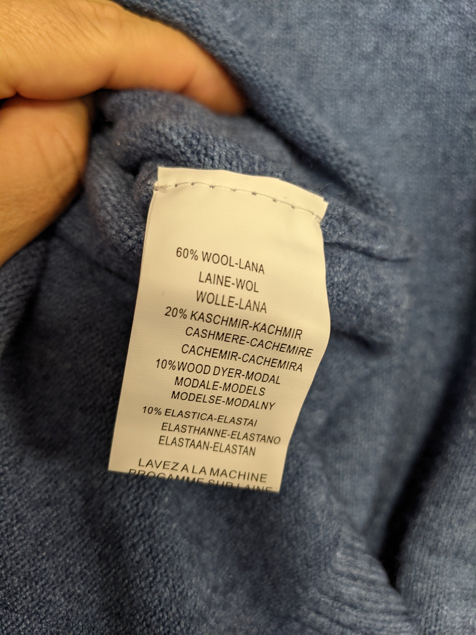 Label showing the material composition of the sweater
