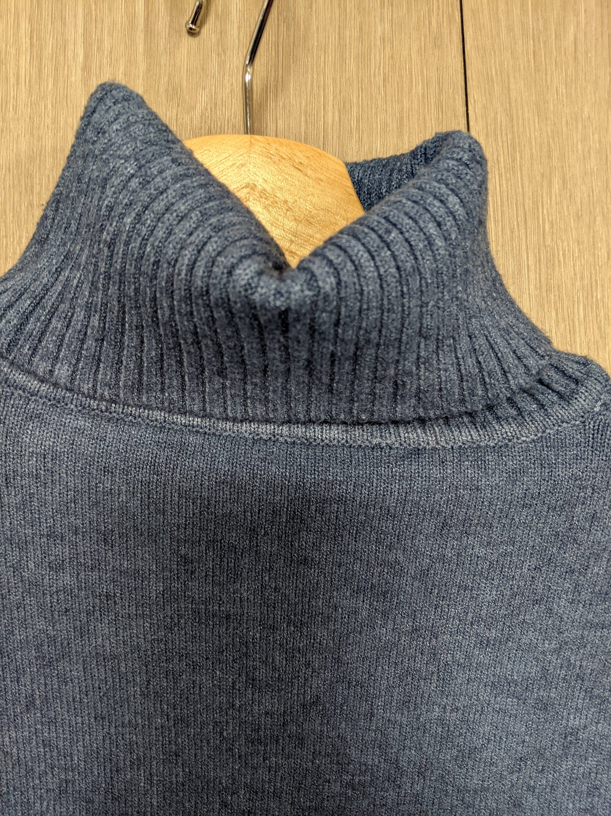 Detailed view of the turtleneck collar