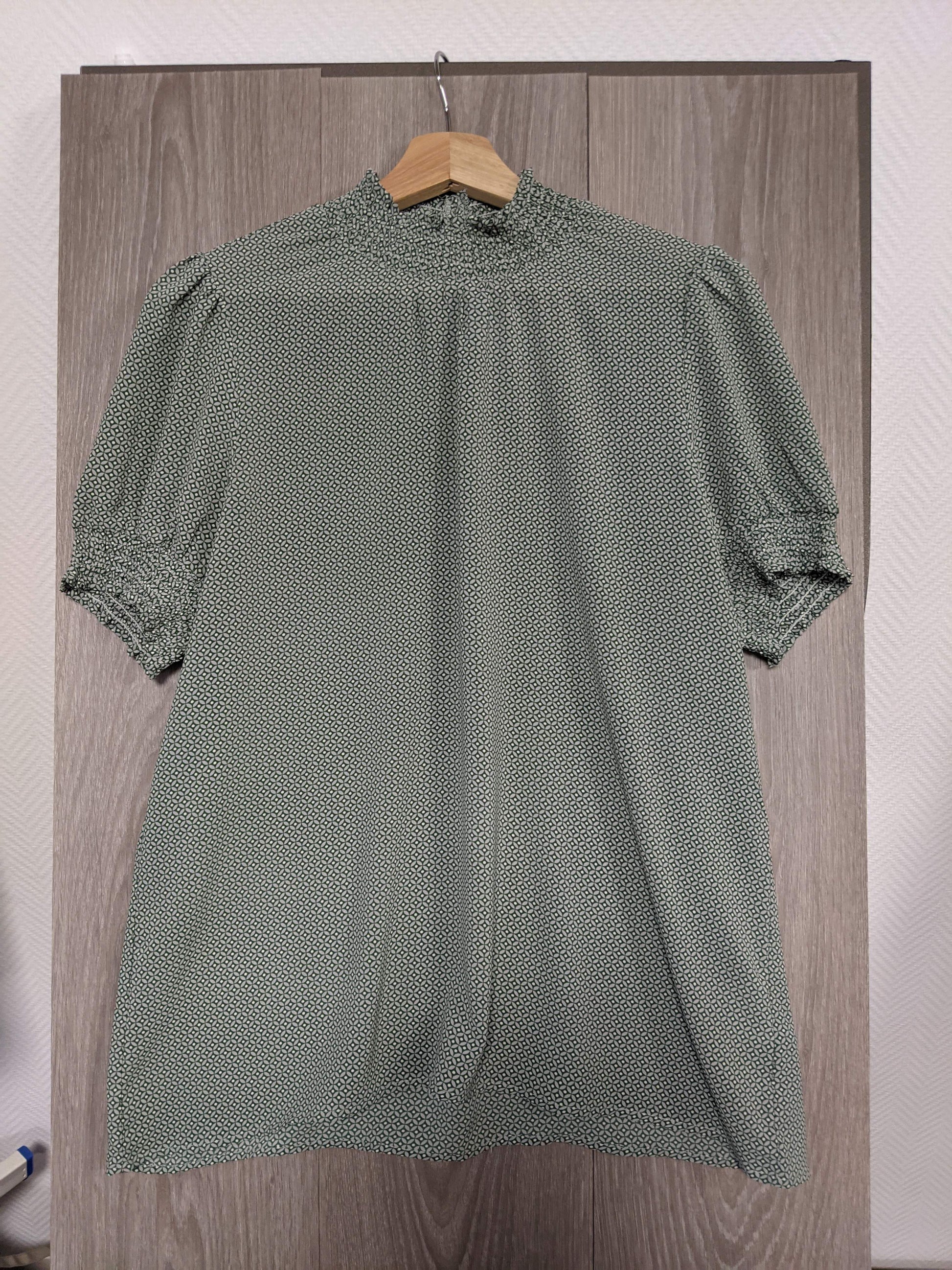 Front view of the green printed blouse