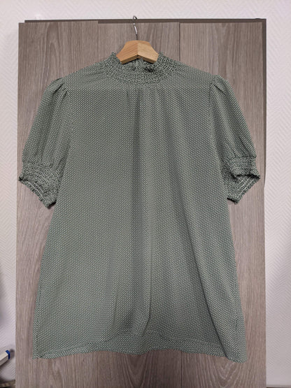 Front view of the green printed blouse