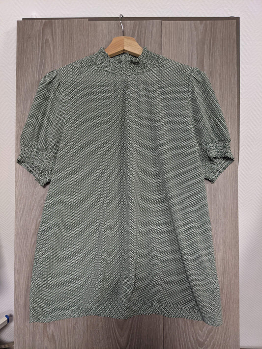 Front view of the green printed blouse