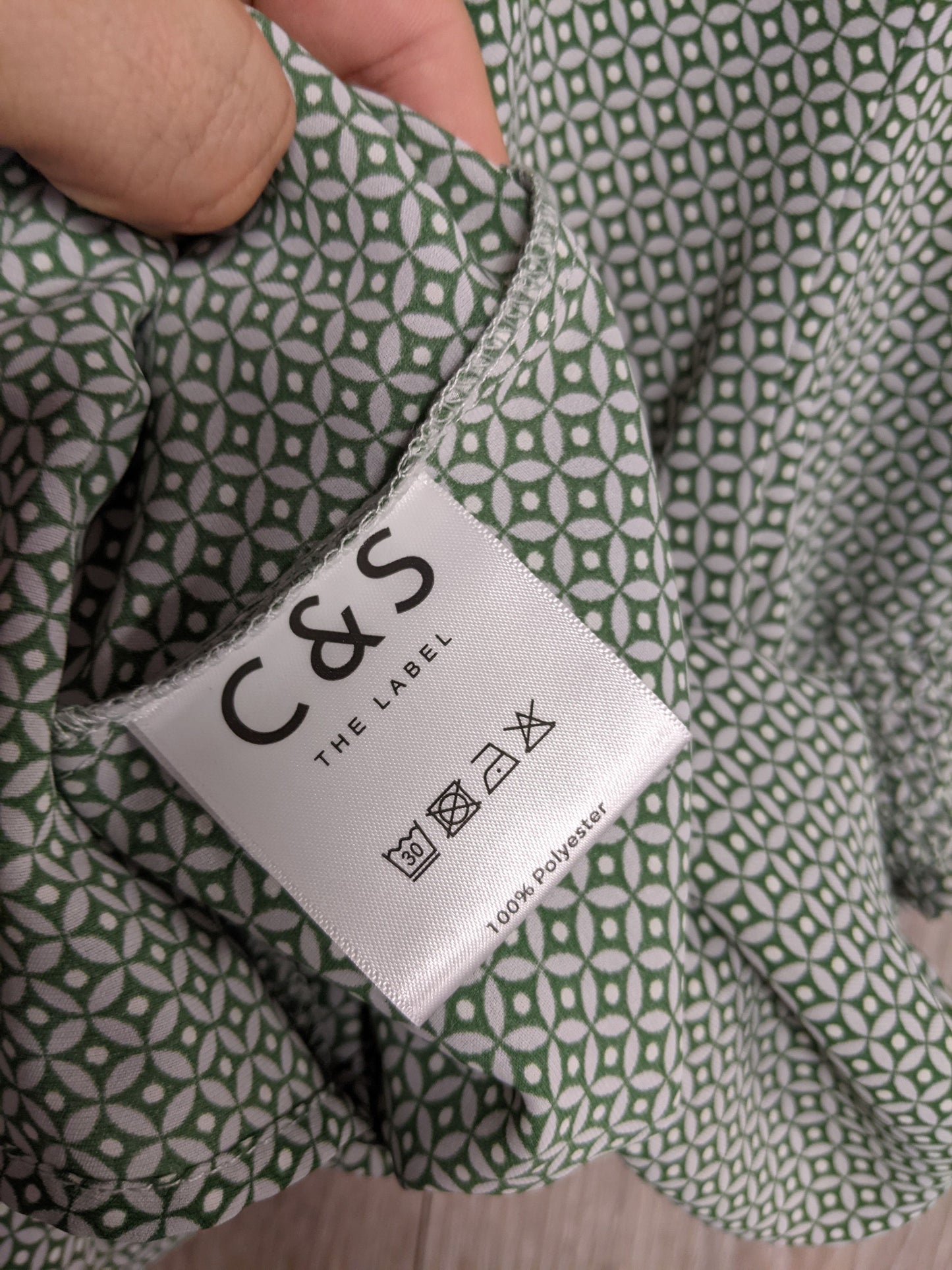 Care label showing fabric content and washing instructions