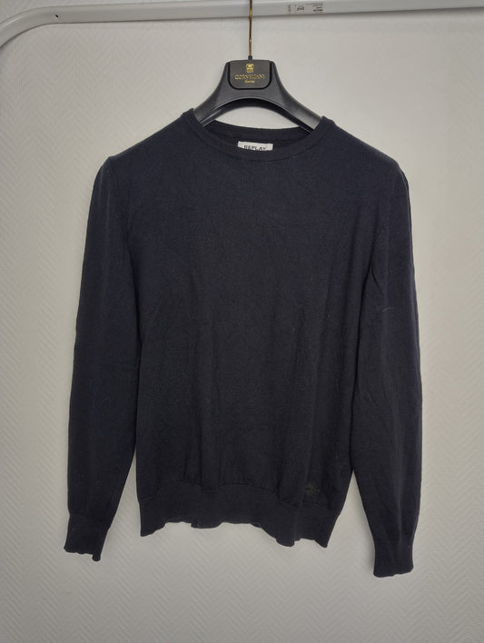 Front view of black sweater on hanger