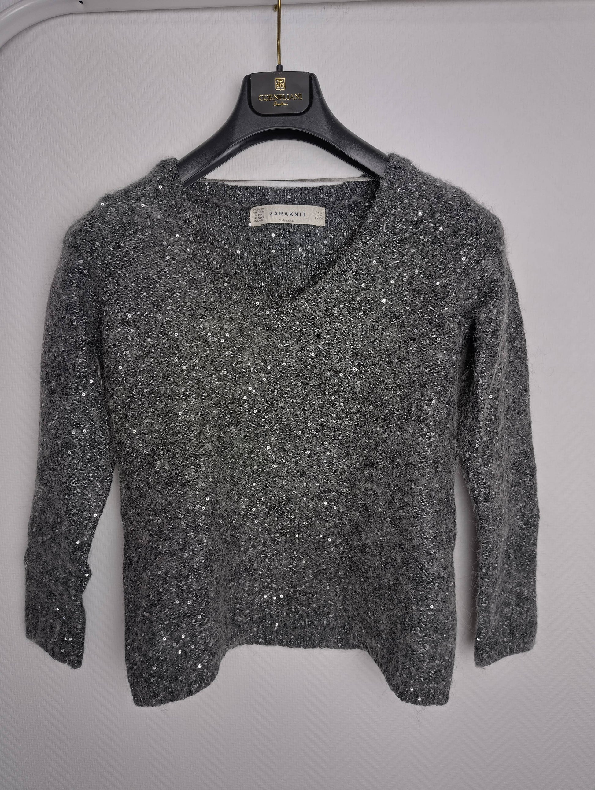Front view of gray Zaraknit sweater