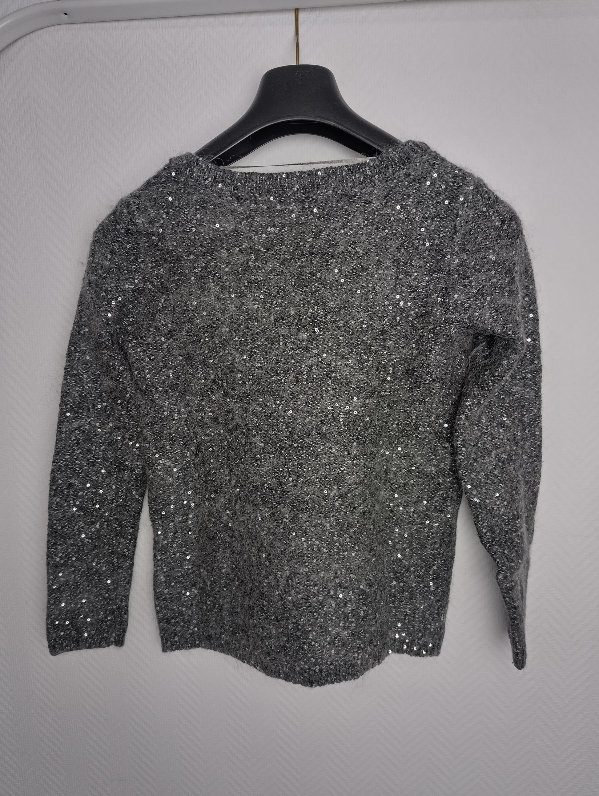 Back view of gray Zaraknit sweater