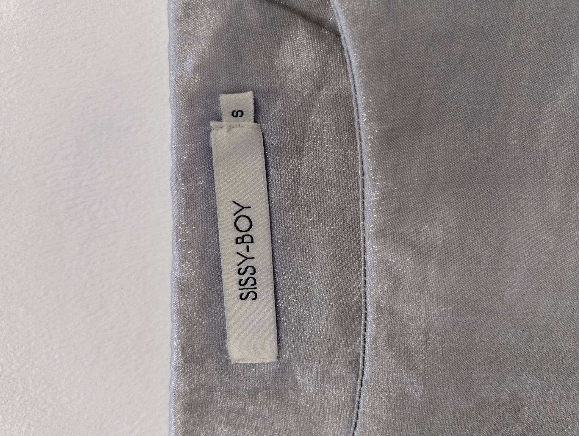 Tag of Sissy-Boy top