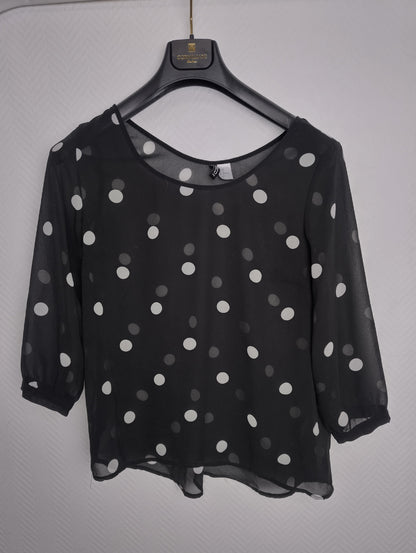 Black polka dot blouse front view