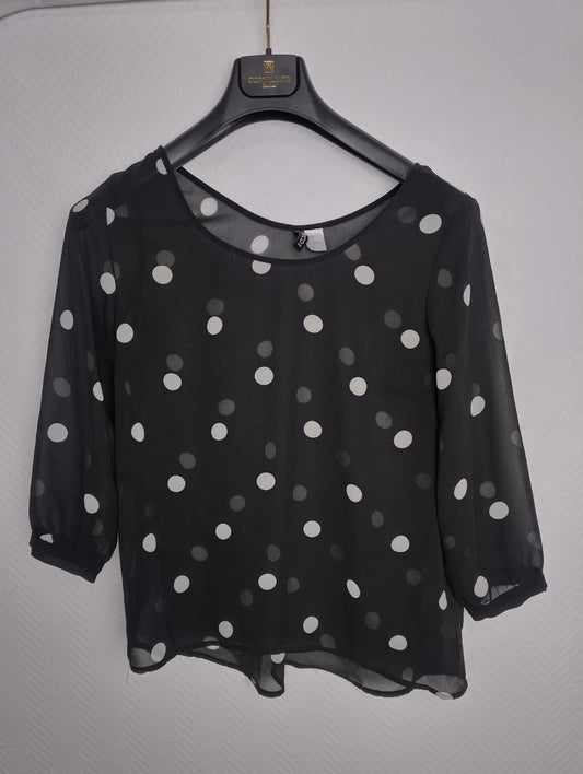 Black polka dot blouse front view