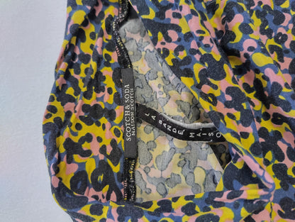 Close-up of the neckline and label