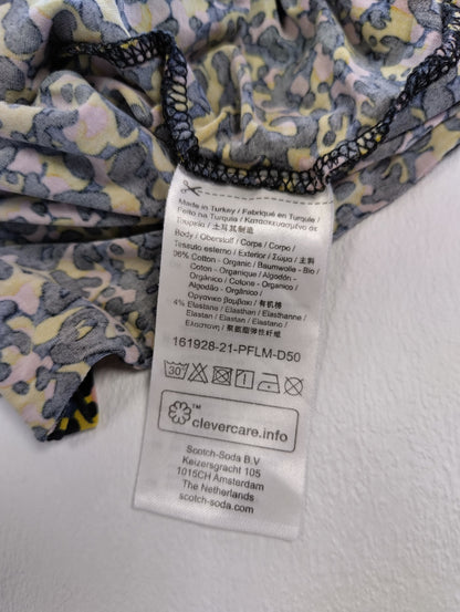 Care label showing 100% organic cotton