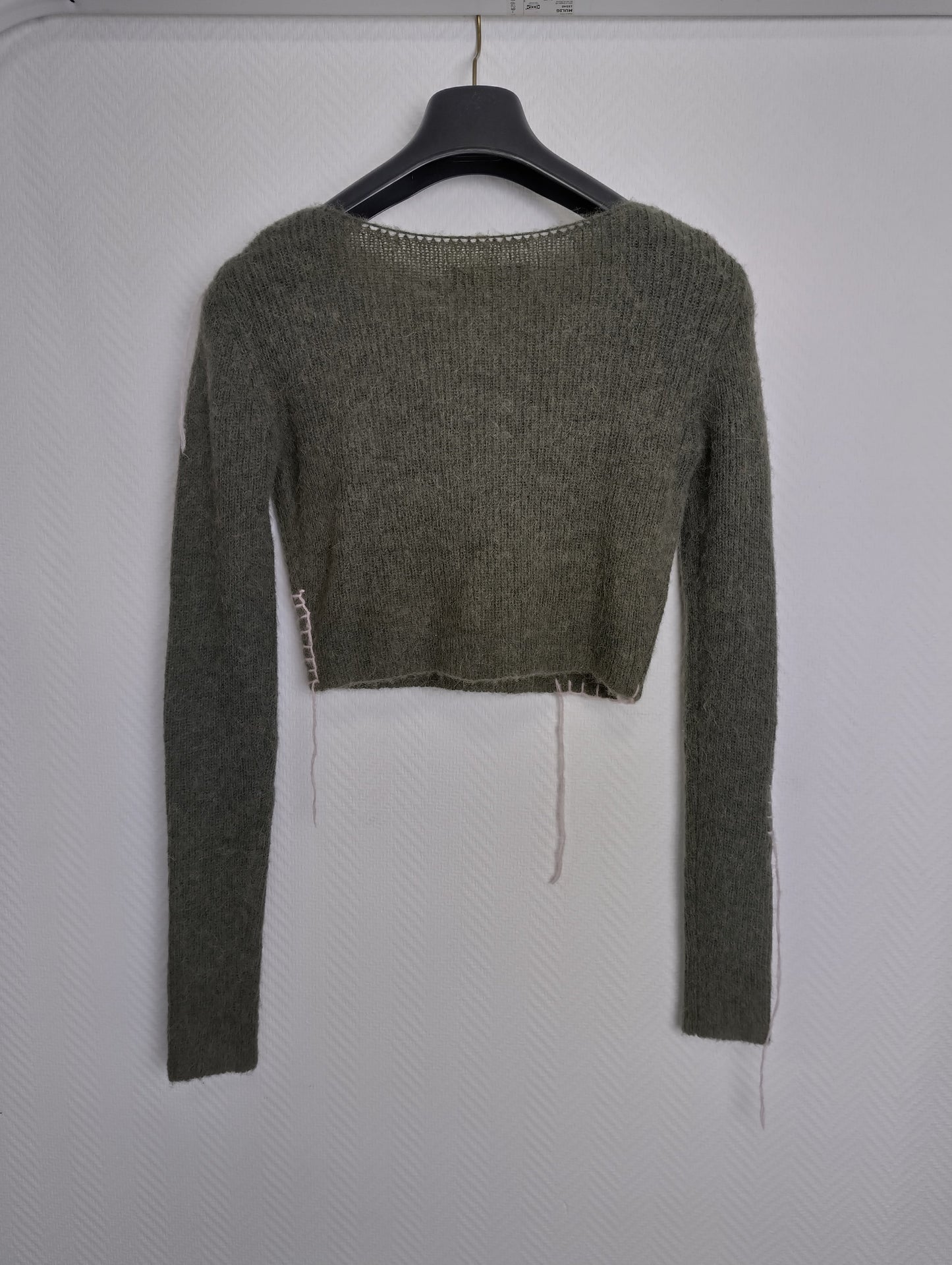 Side view of cropped sweater