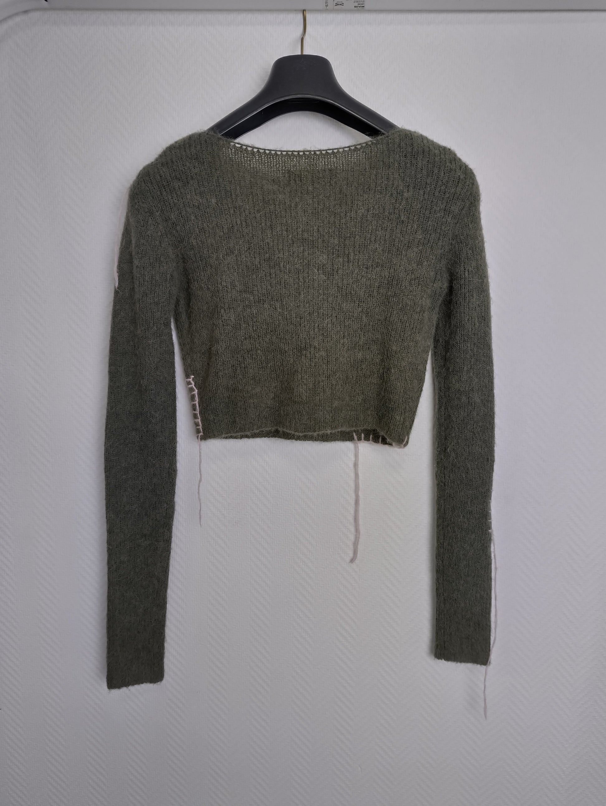 Side view of cropped sweater