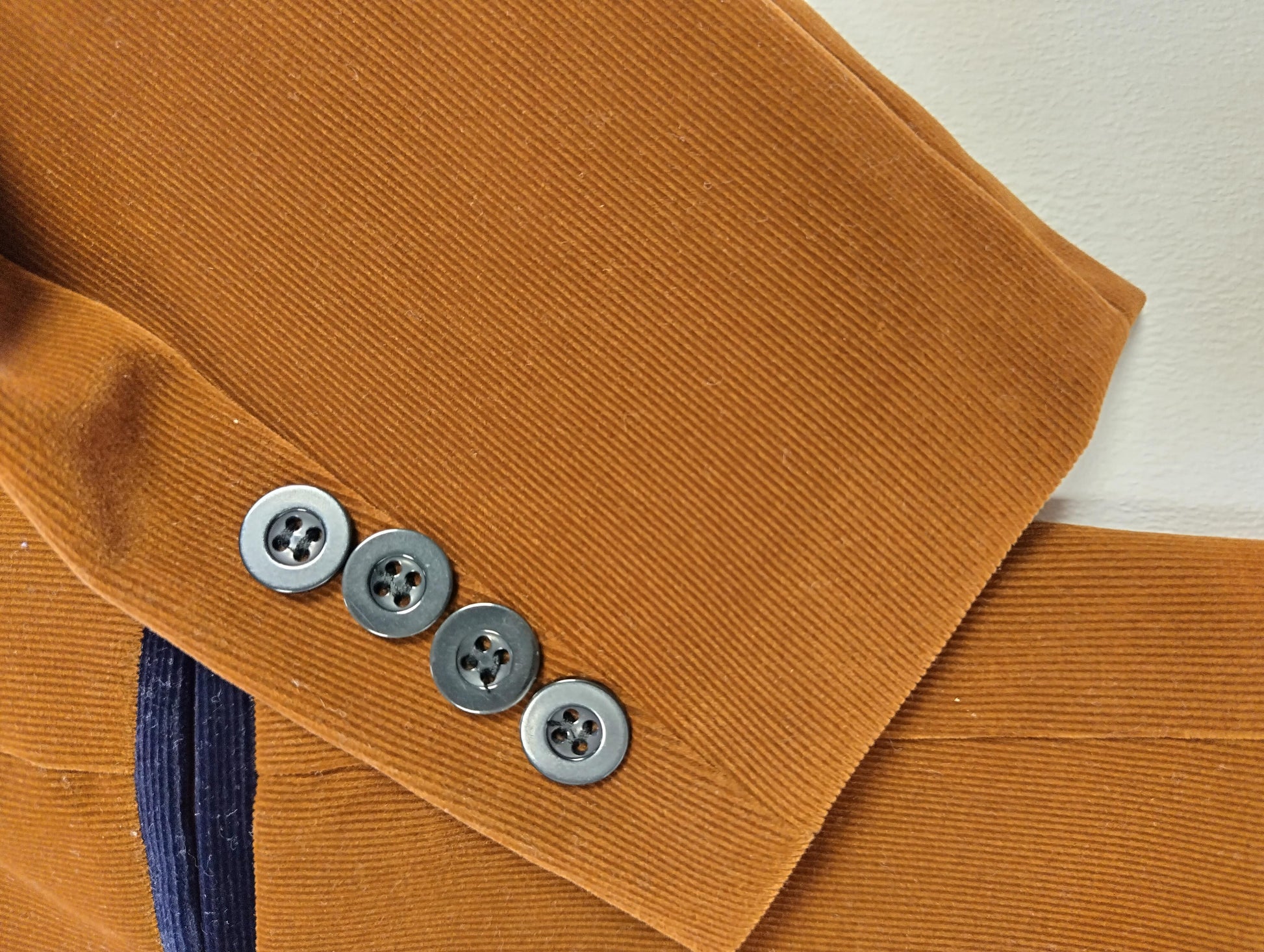 Close-up of blazer cuffs