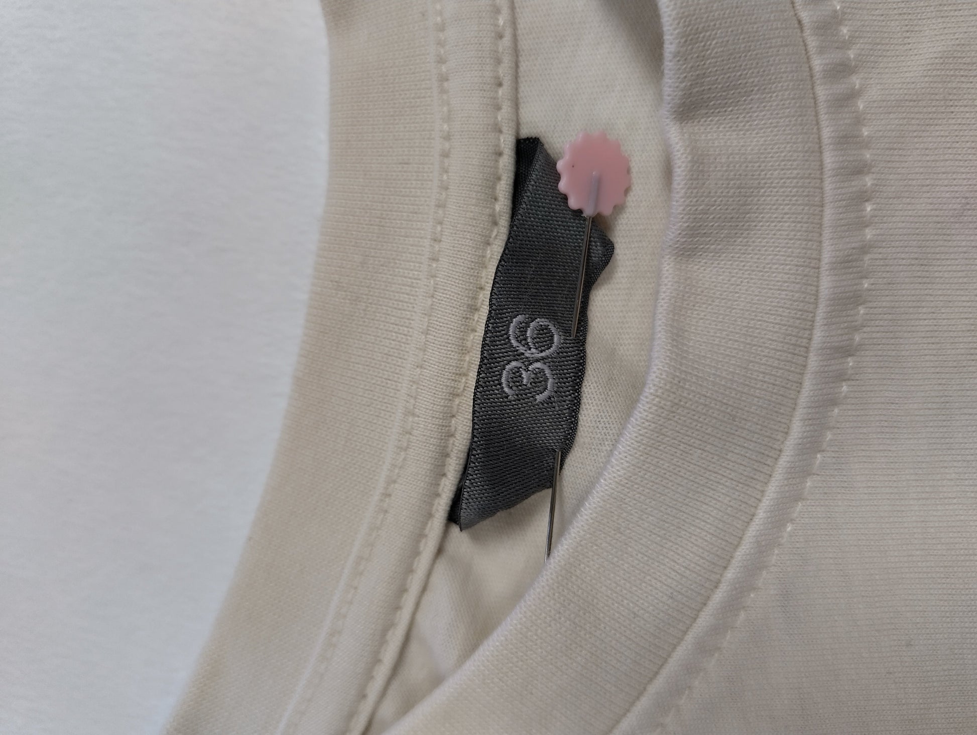 Close-up of label on t-shirt