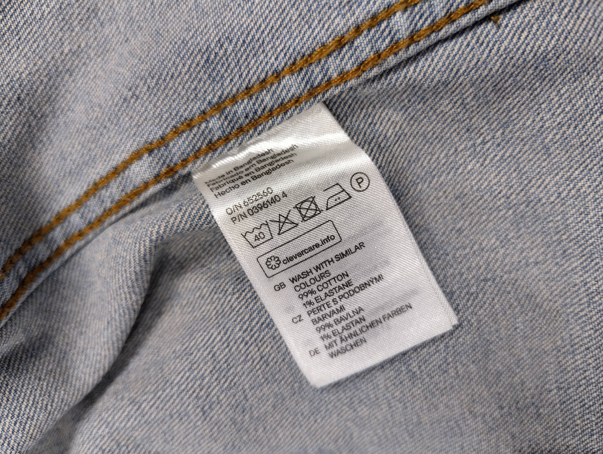 Care label with washing instructions for denim jacket