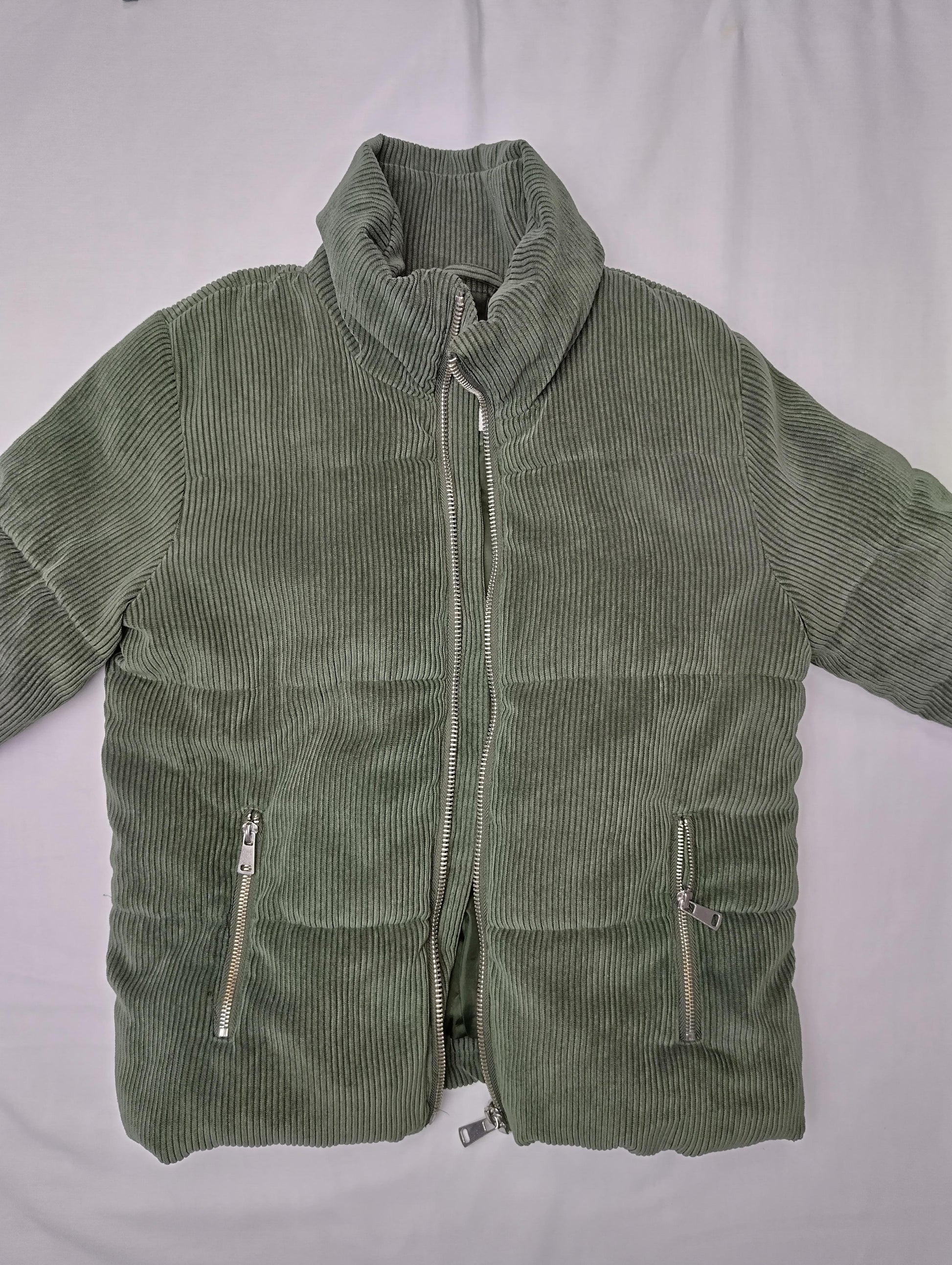 Front view of olive green corduroy jacket