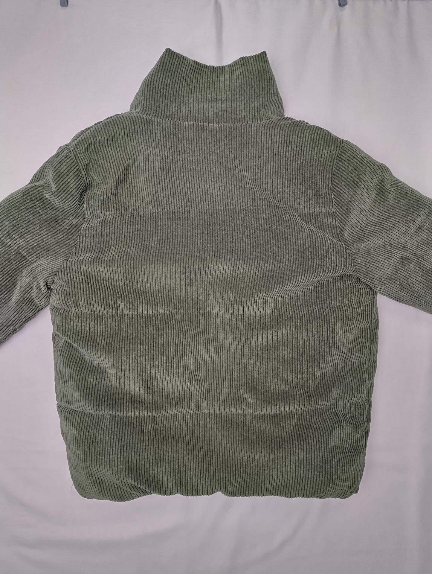 Back view of olive green corduroy jacket