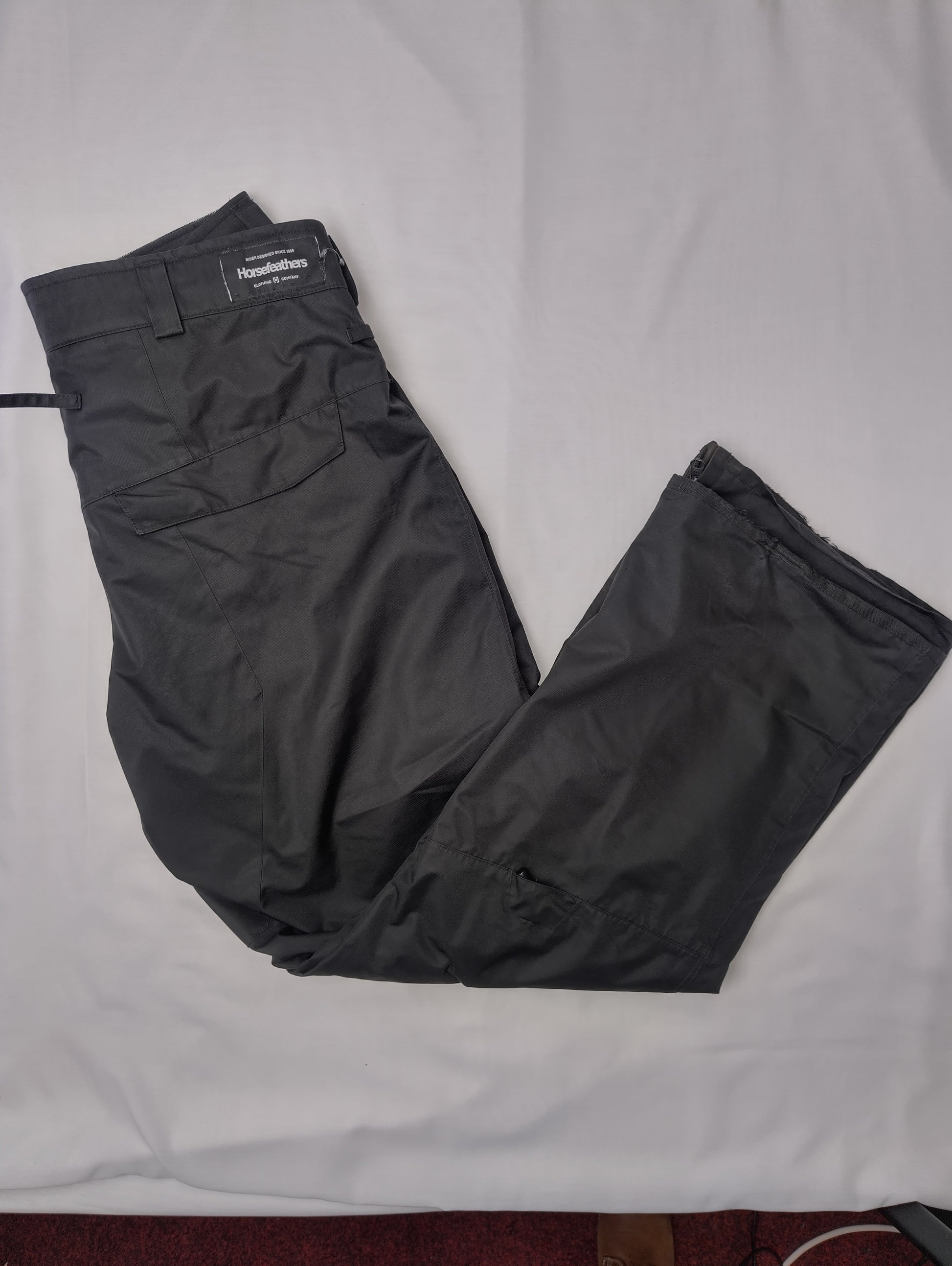 Side view of Horsefeathers pants