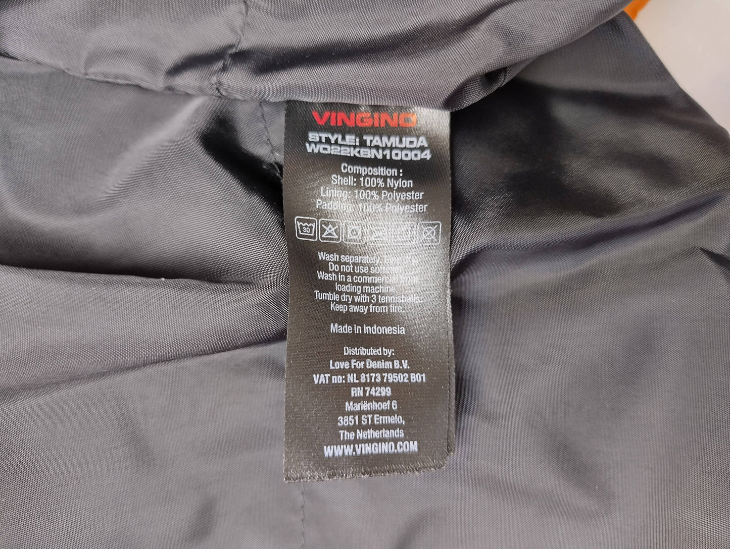 Care label attached inside the jacket