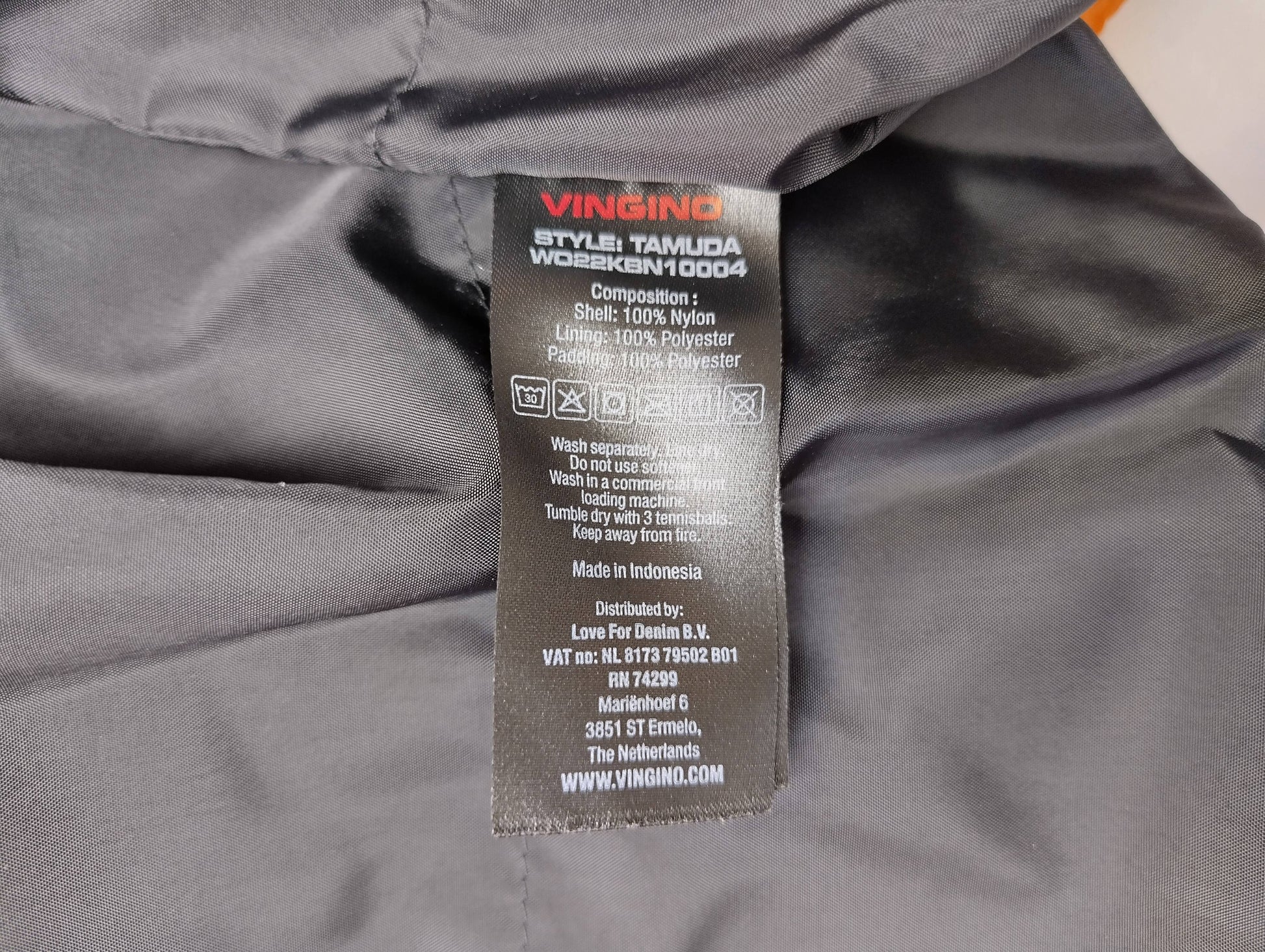 Care label attached inside the jacket