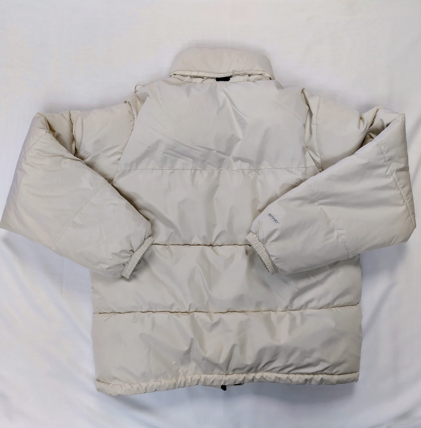 Back view of cream puffer jacket