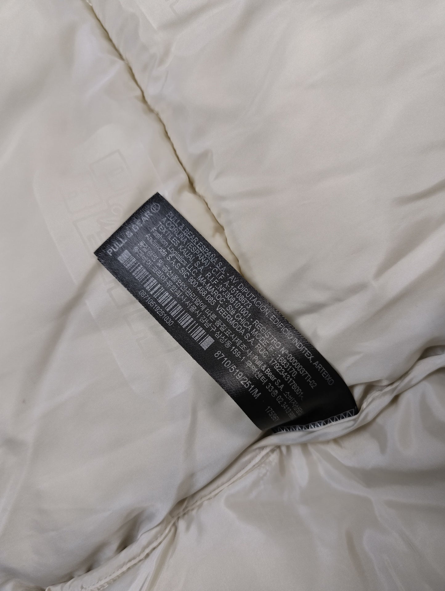 Care instruction tag inside puffer jacket