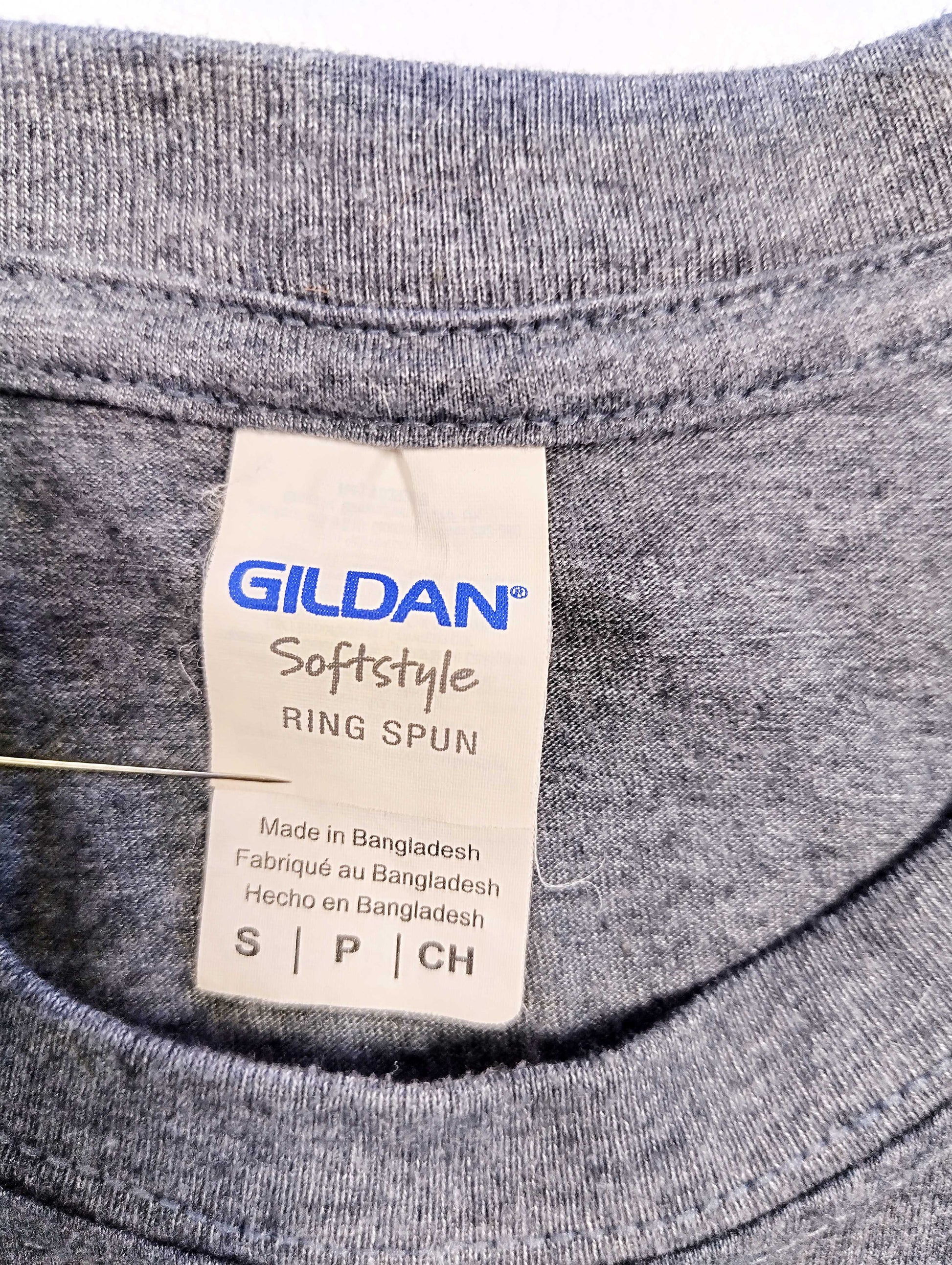 Close-up of Gildan label on t-shirt