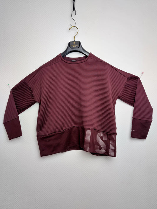 Front view of burgundy Nike Dri-FIT sweatshirt