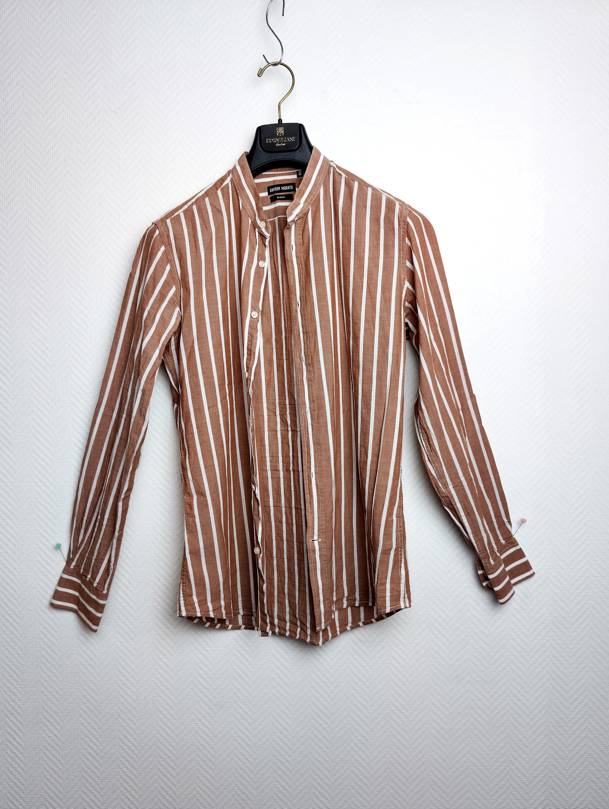 Front view of the brown and white striped shirt