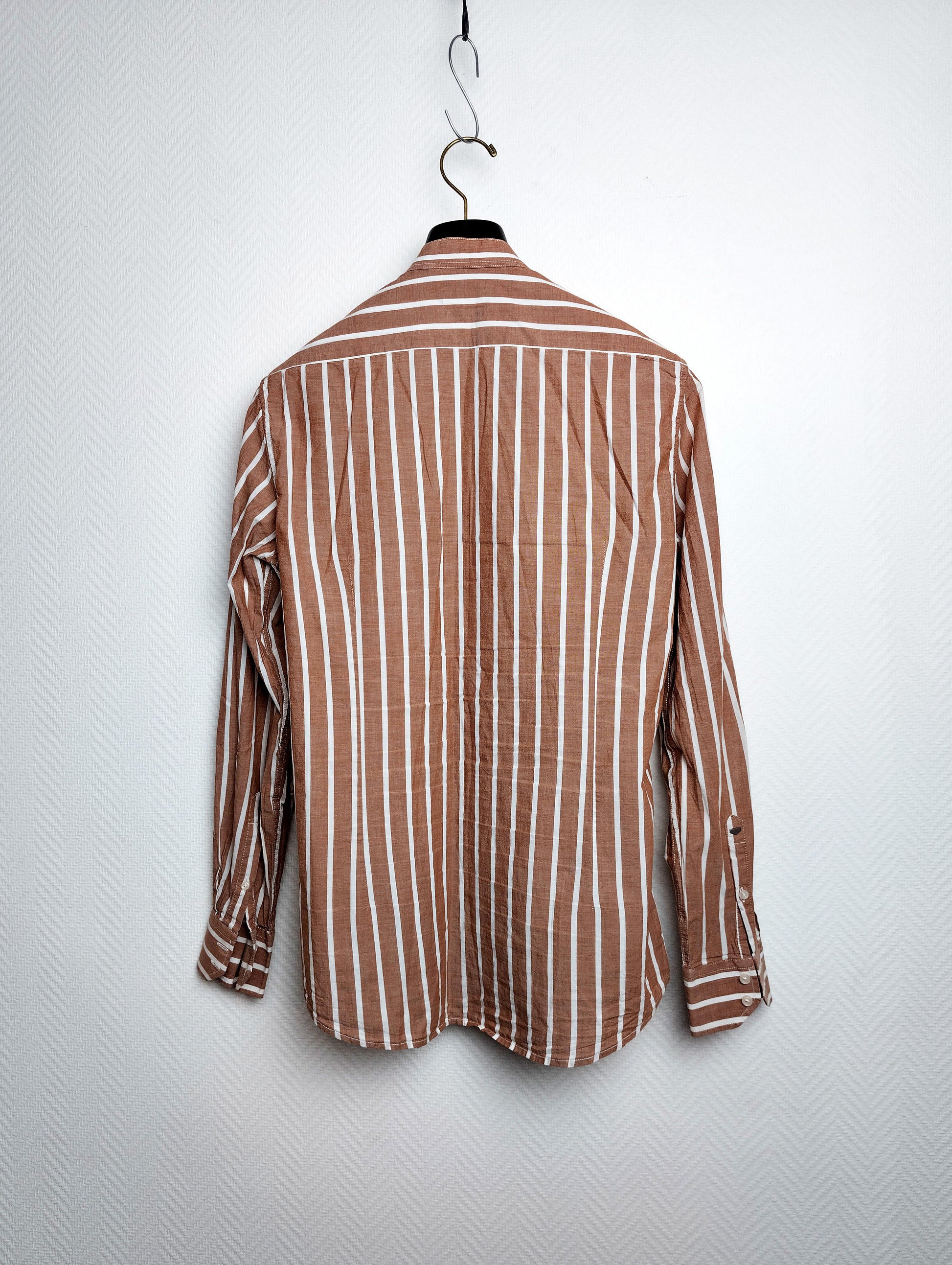 Back view of the brown and white striped shirt
