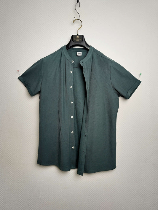 Front view of a dark green short-sleeve shirt
