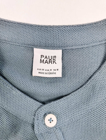 Close-up of the shirt's collar and label