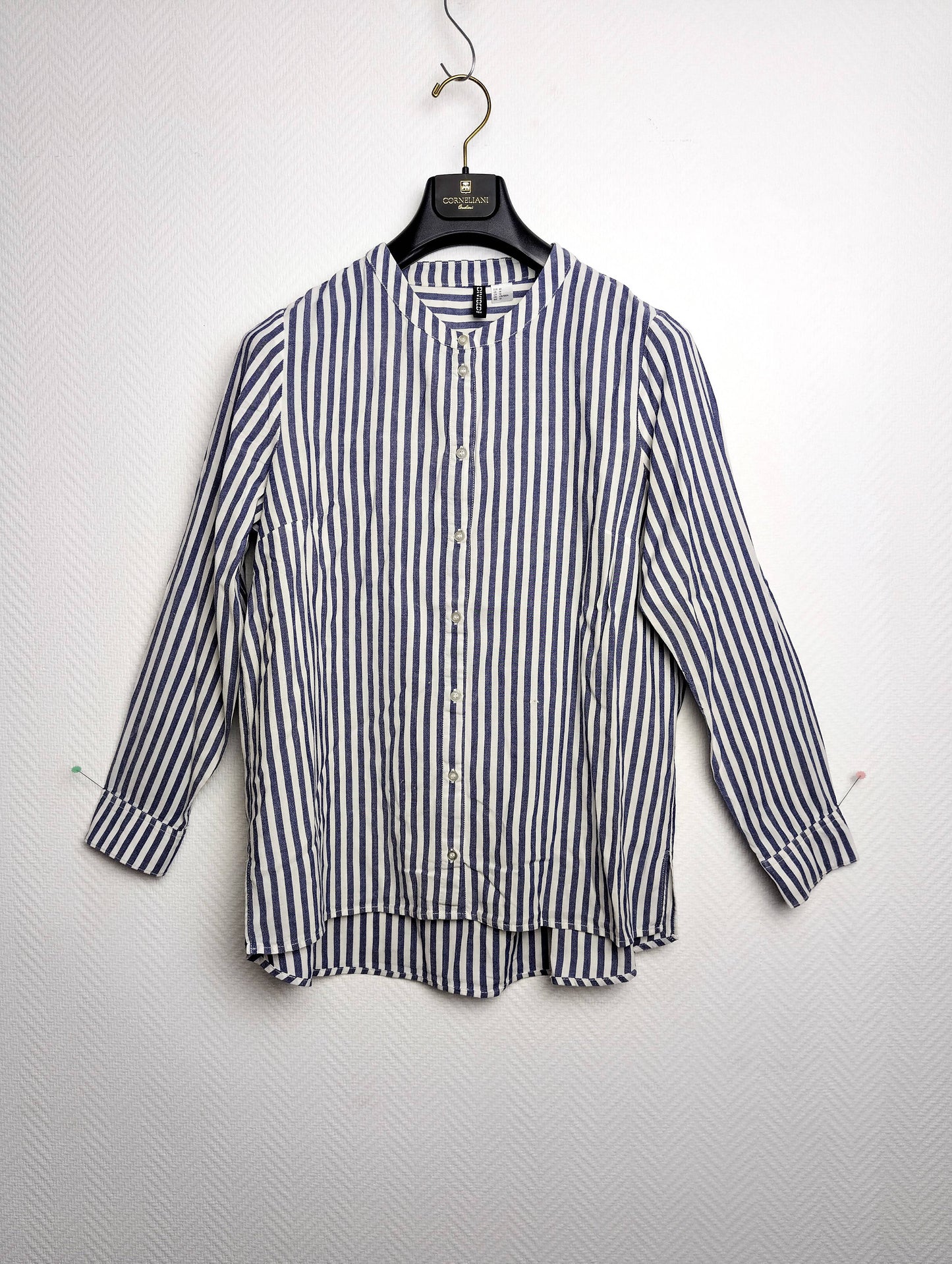 Front view of striped button-up shirt