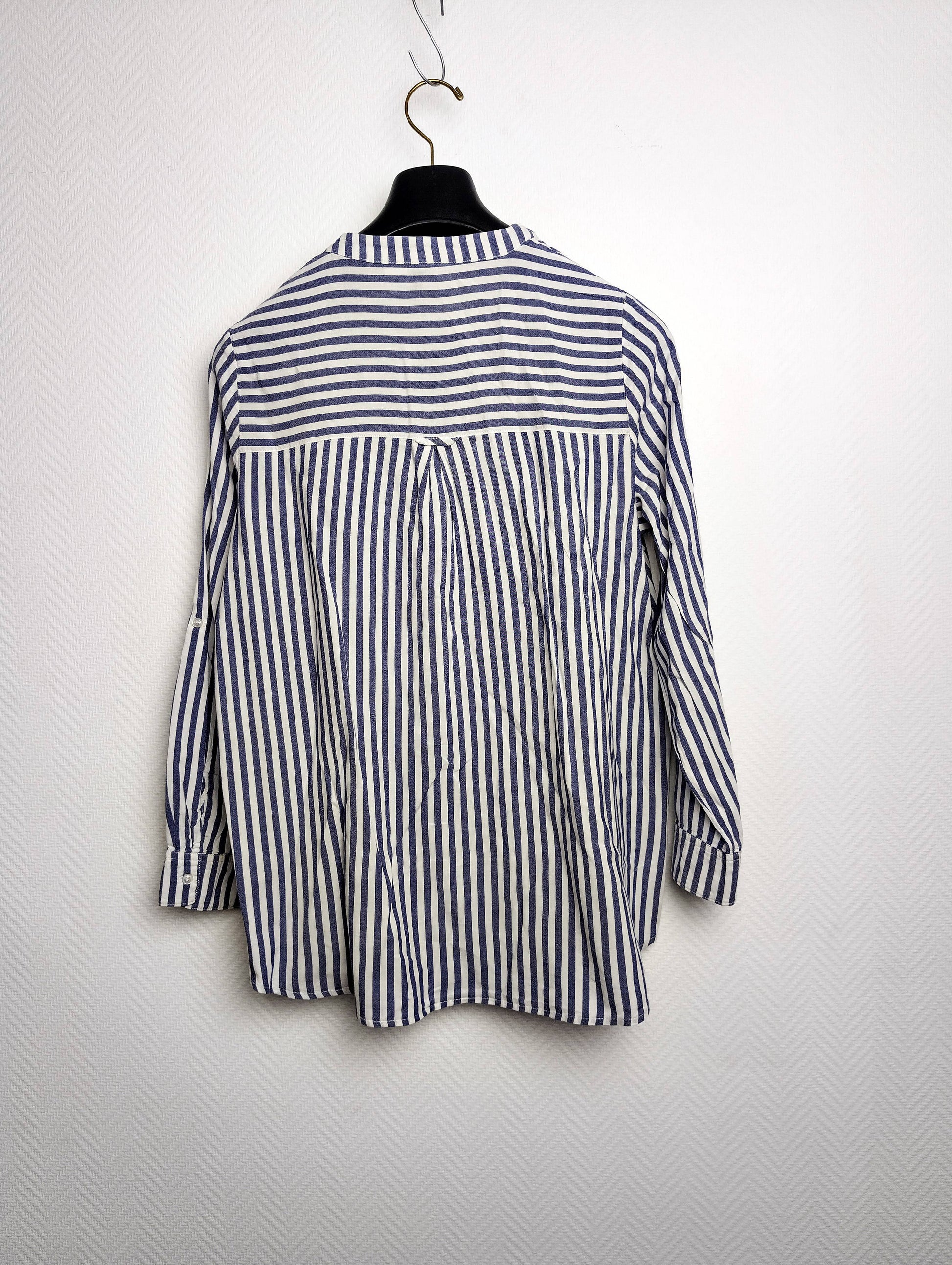 Back view of striped button-up shirt