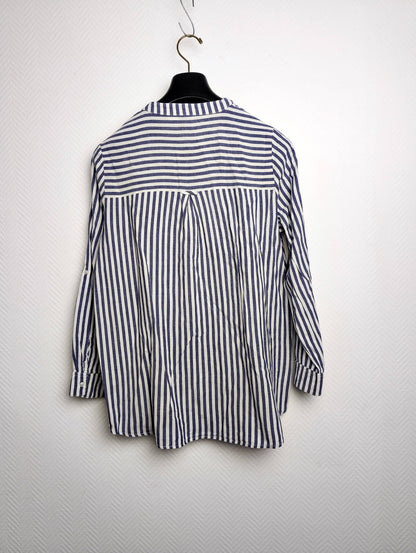 Back view of striped button-up shirt