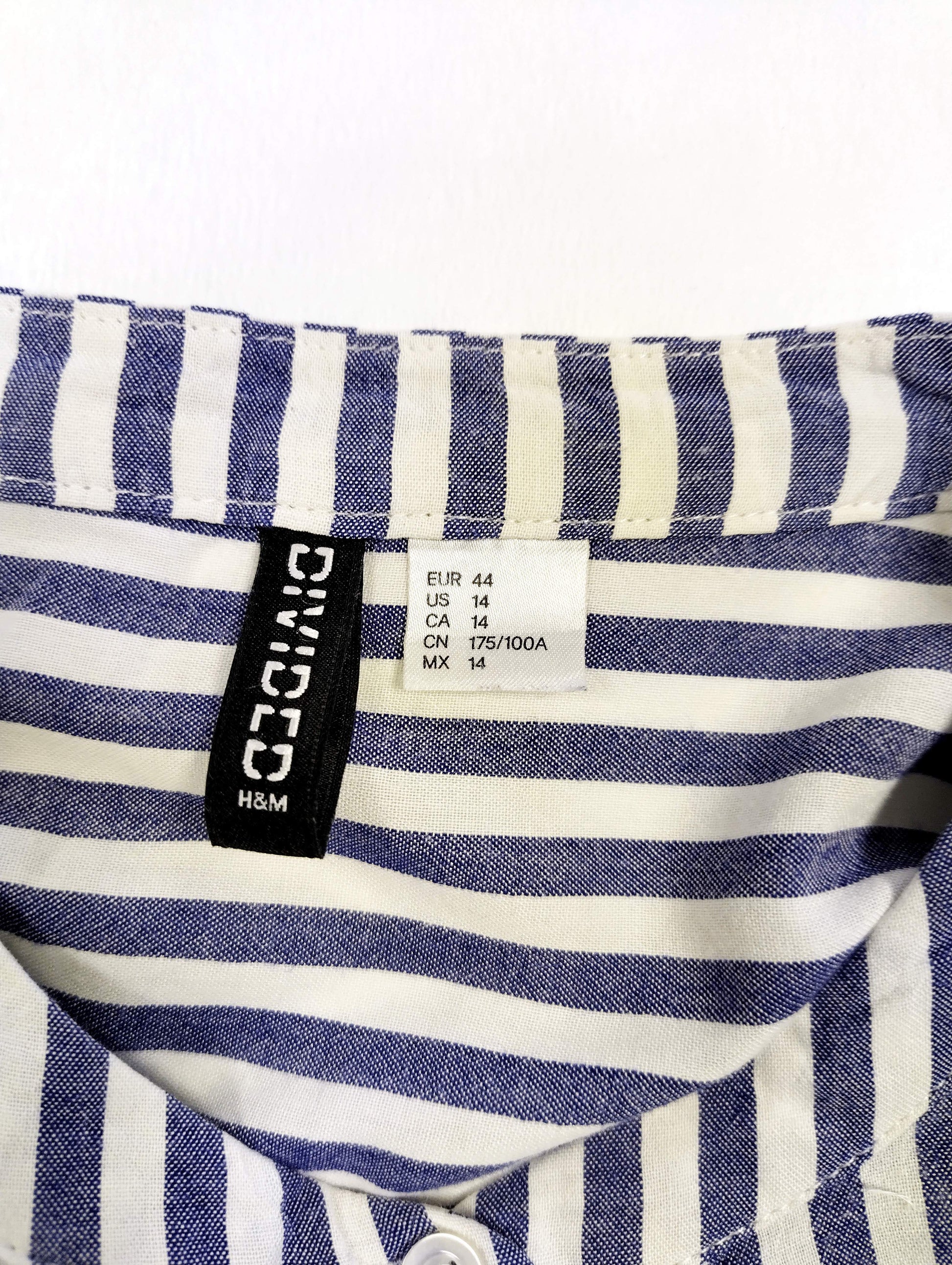Label showing size details of the shirt