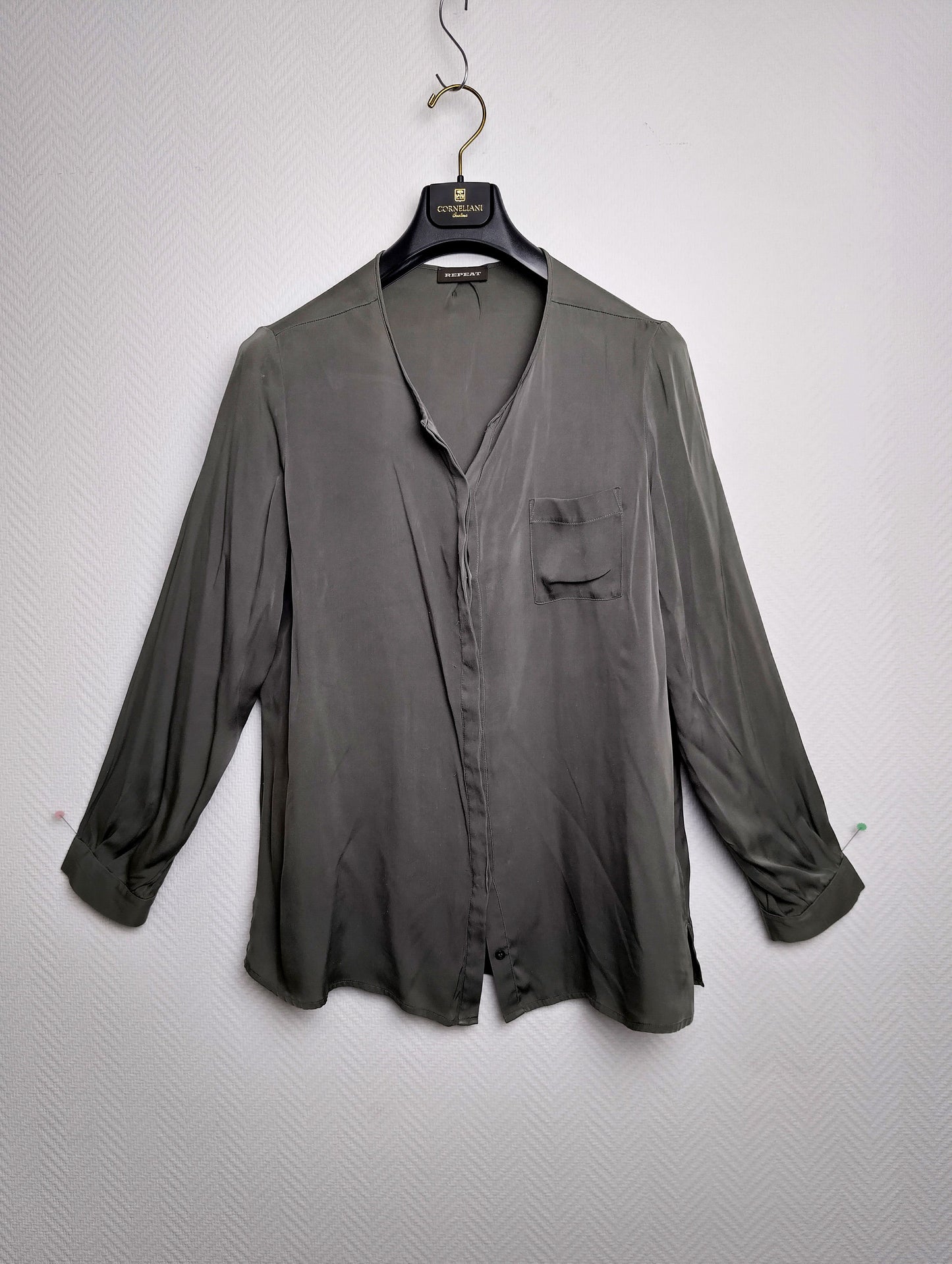 Front view of the olive green shirt