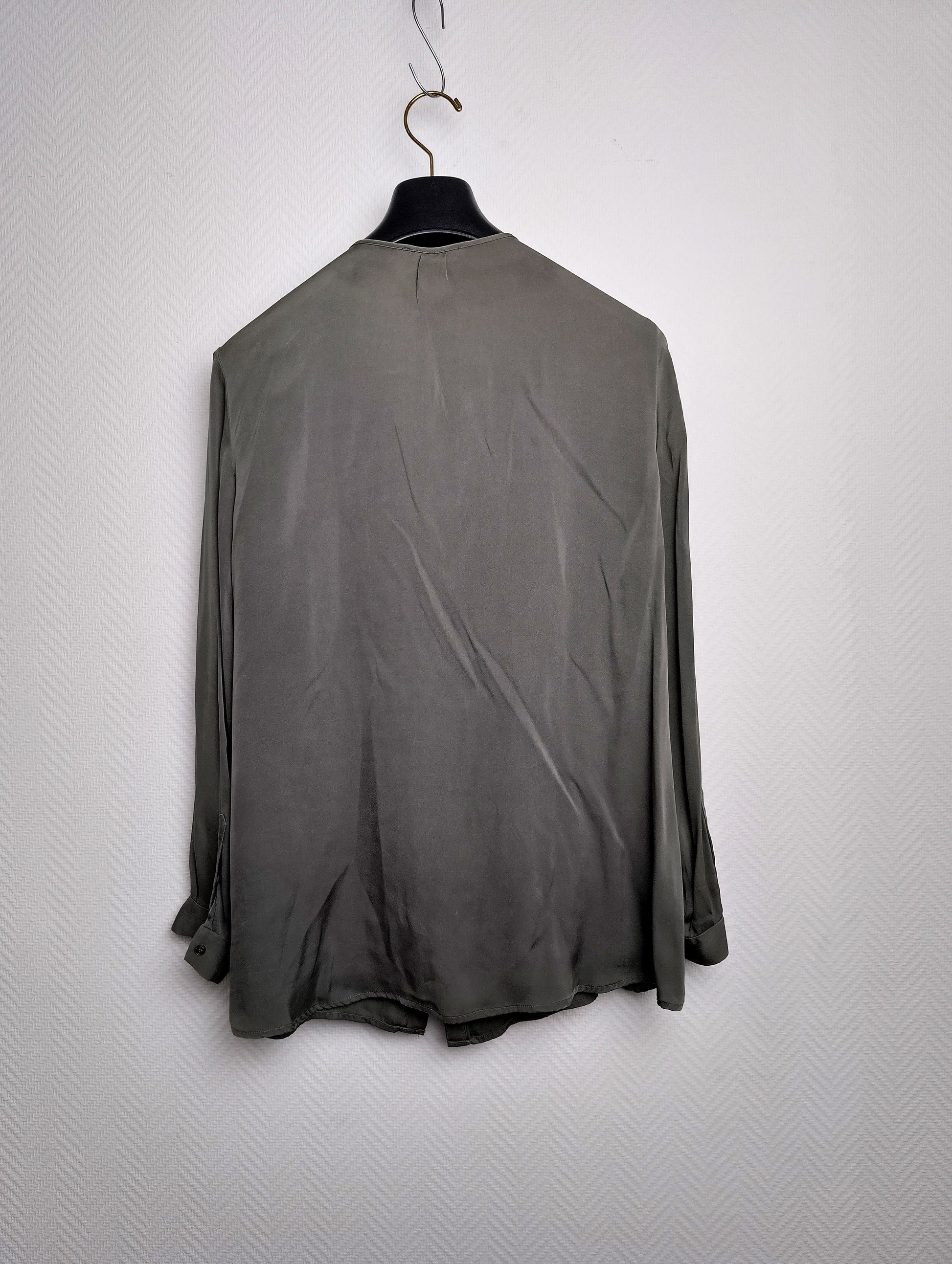 Back view of the olive green shirt