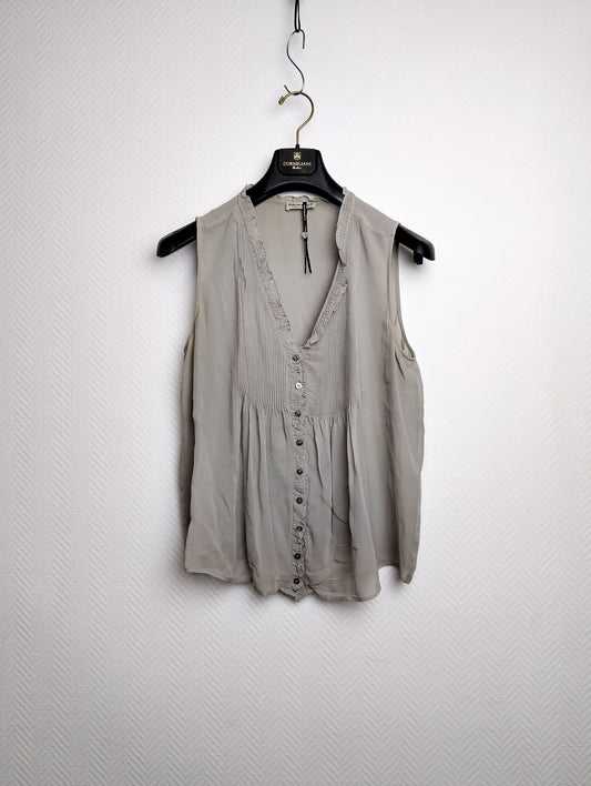 Front view of the sleeveless blouse