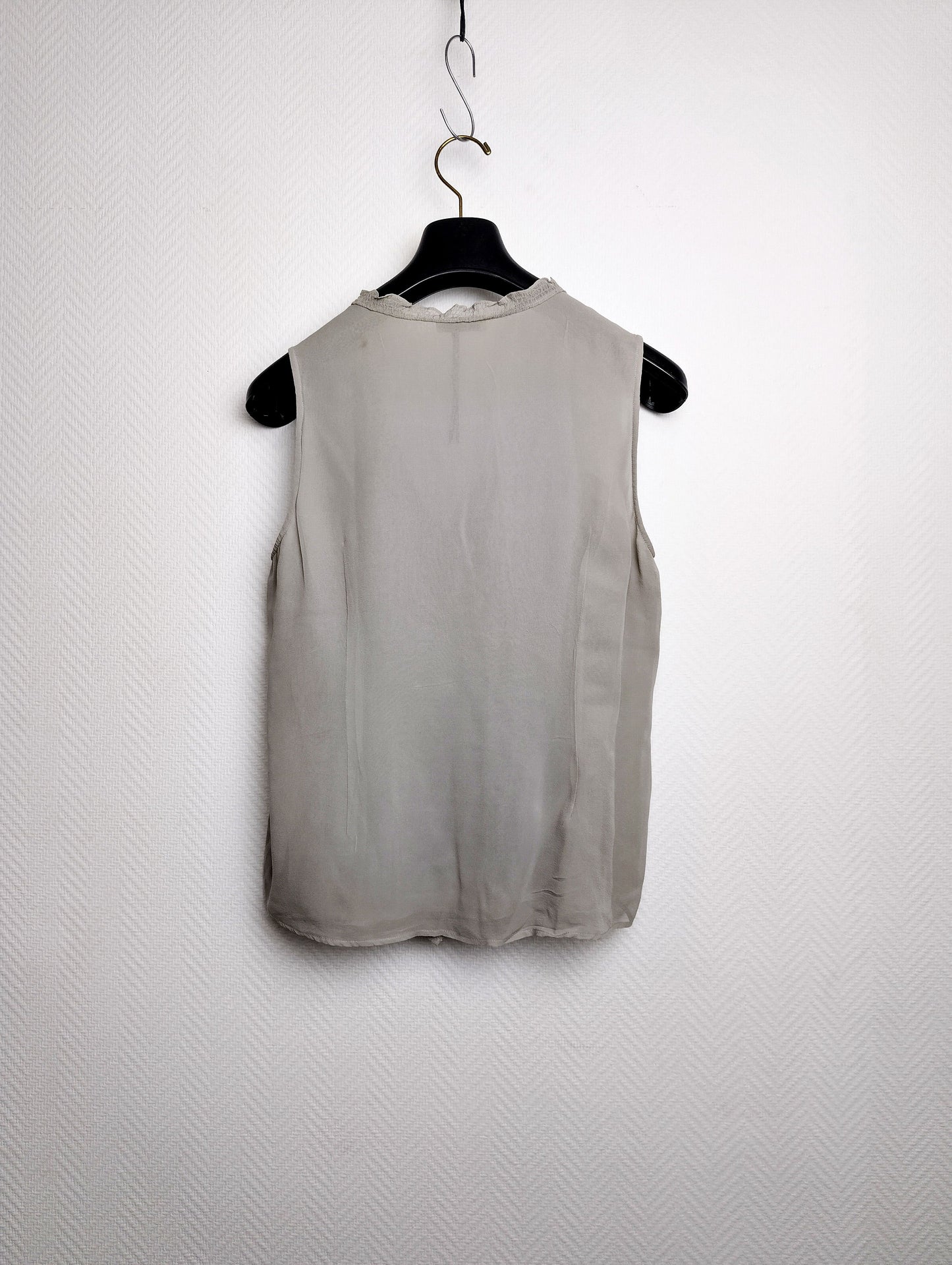 Back view of the sleeveless blouse