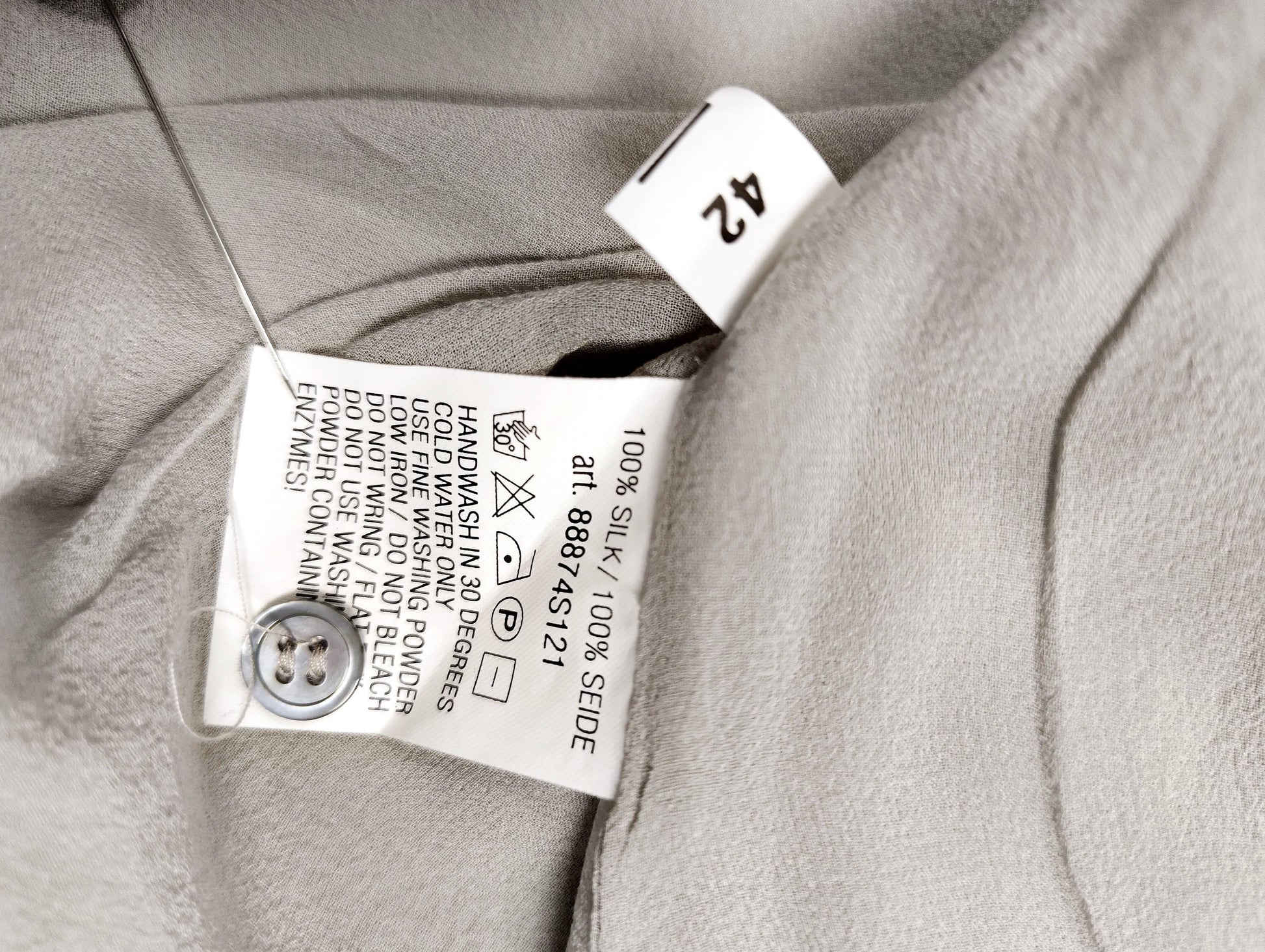 Close-up of the care label and material details