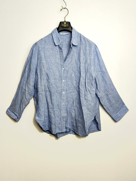 Front view of Zara light blue linen shirt