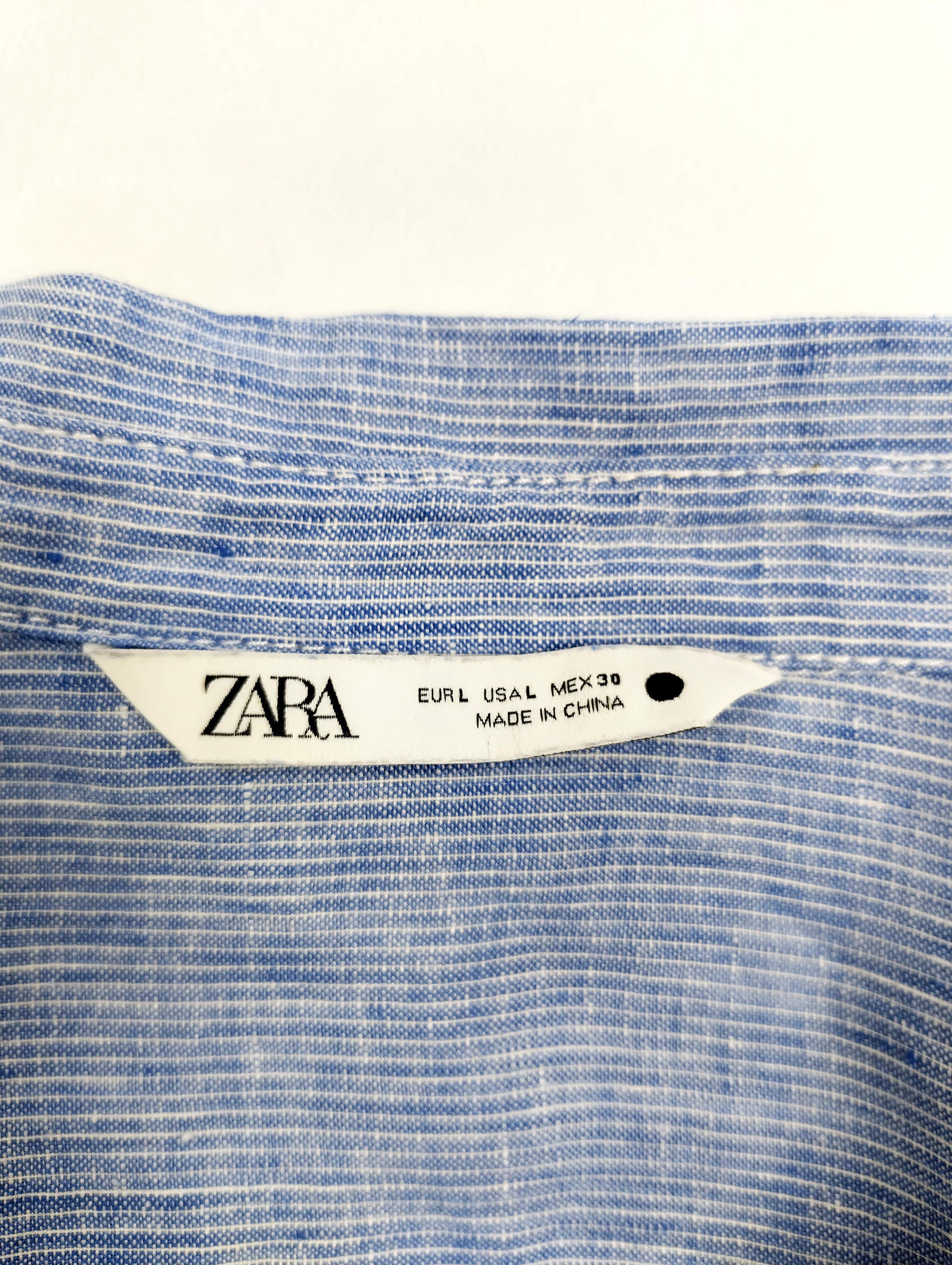 Label of Zara linen shirt with size