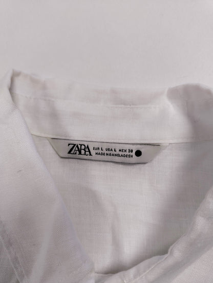 Close-up of the label on the white shirt