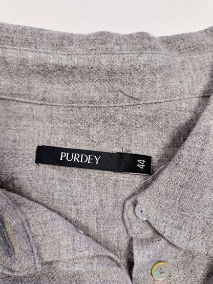 Close-up of label showing size and brand